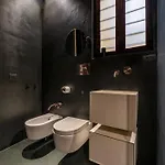 Guesthost - Vintage-modern Trastevere Apartmán Řím